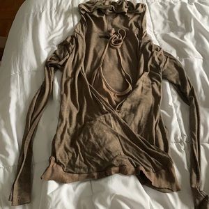 Fun long sleeve top with a hood